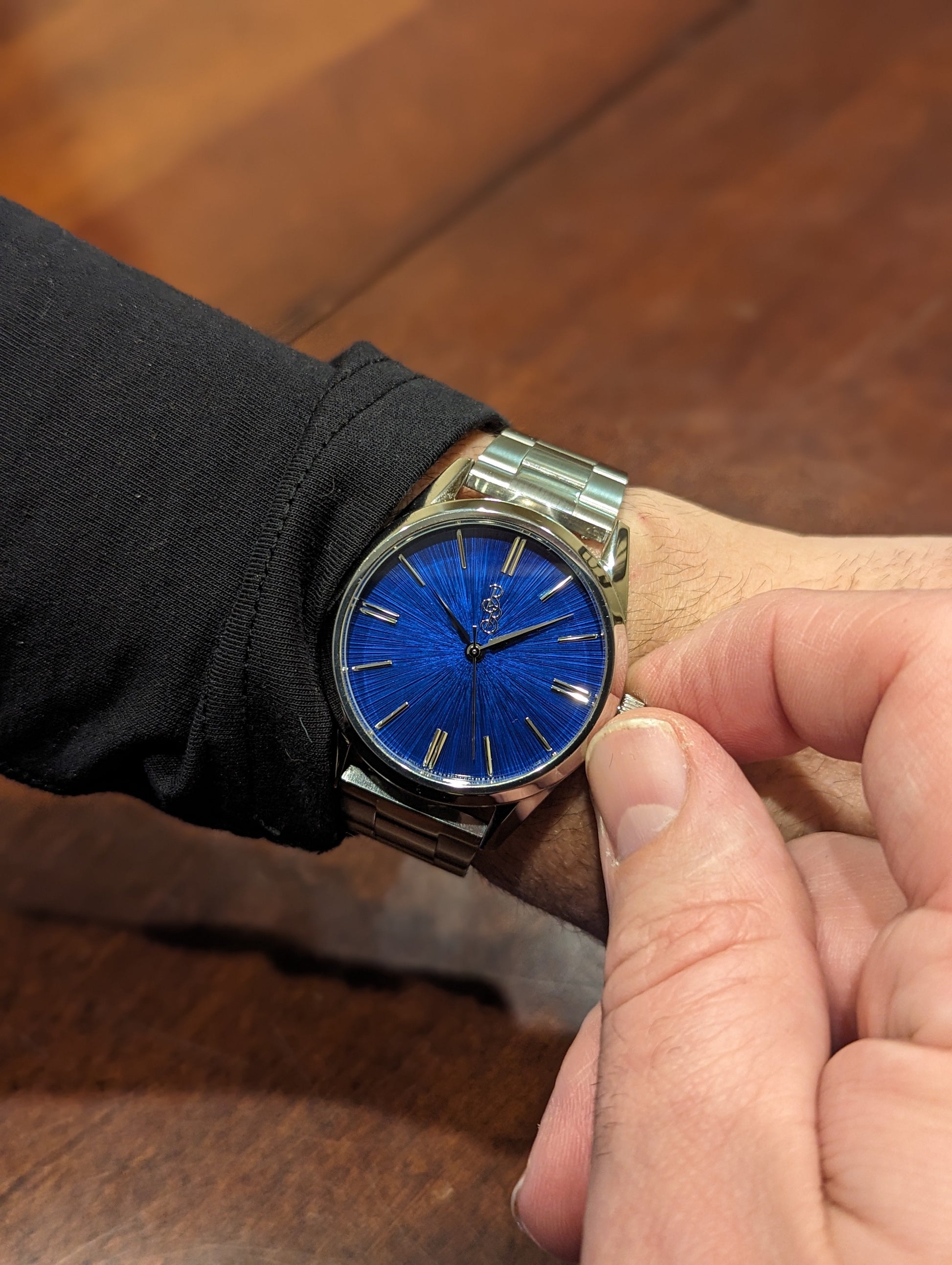 Blue Sunburst Watch on steel being set, gift for him