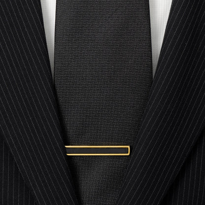 Gold and onyx tie clip close-up, custom wedding gift for the groom