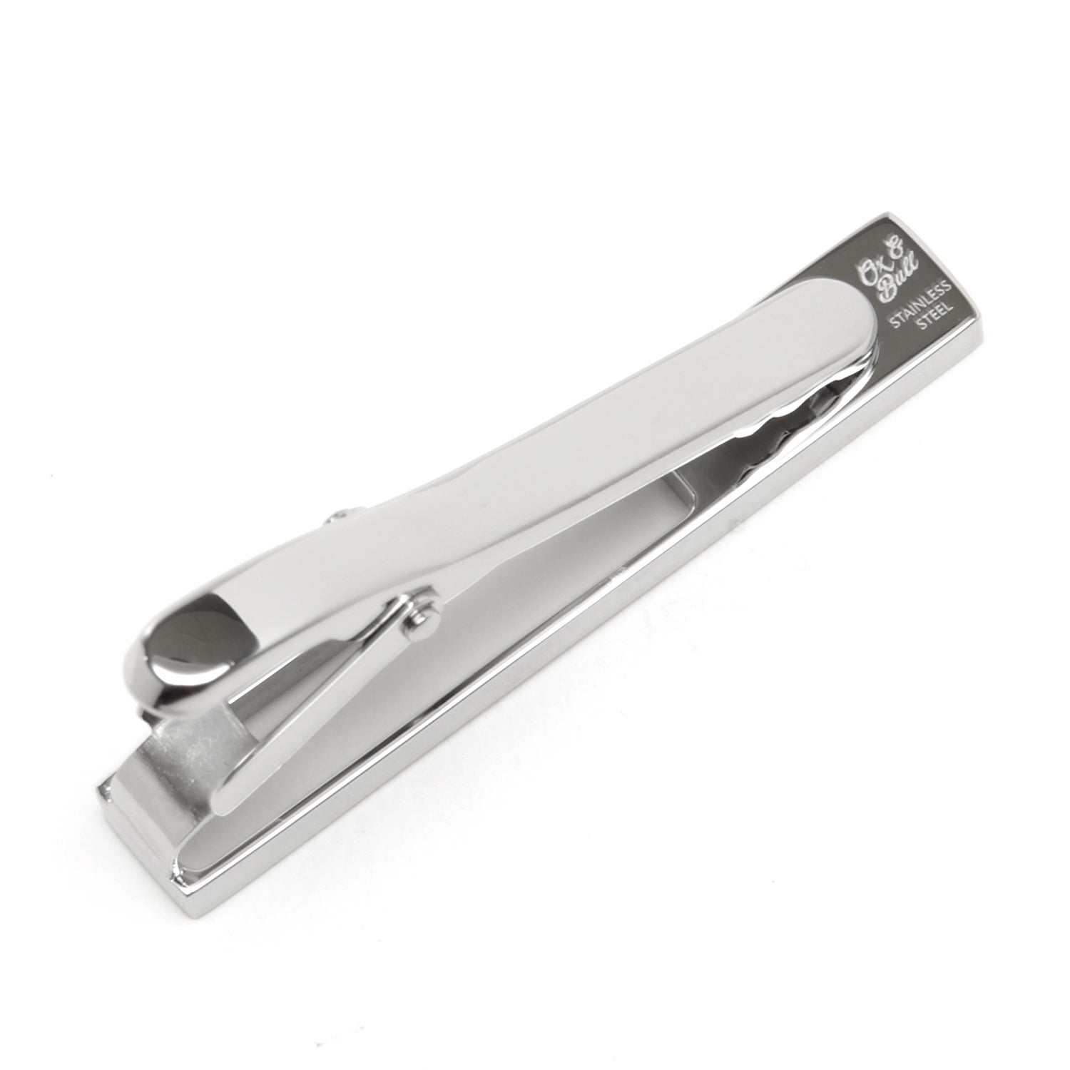 Die cut metal tie clip on necktie close-up, modern gift for him