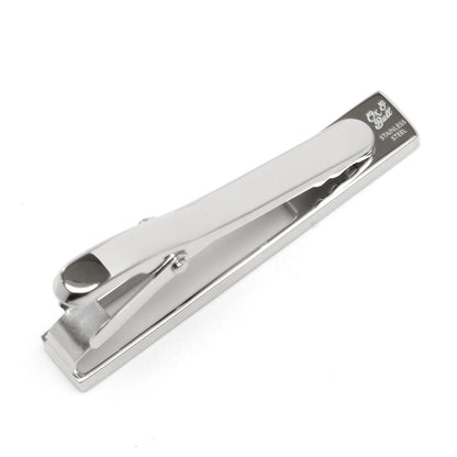 Die cut metal tie clip on necktie close-up, modern gift for him