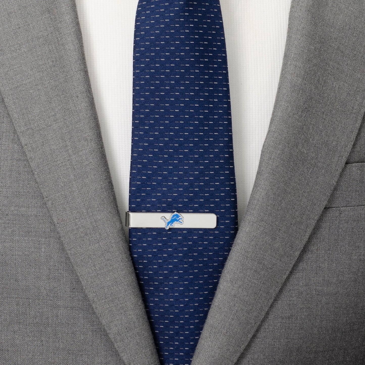 Lions logo cufflink close-up, officially licensed NFL gift
