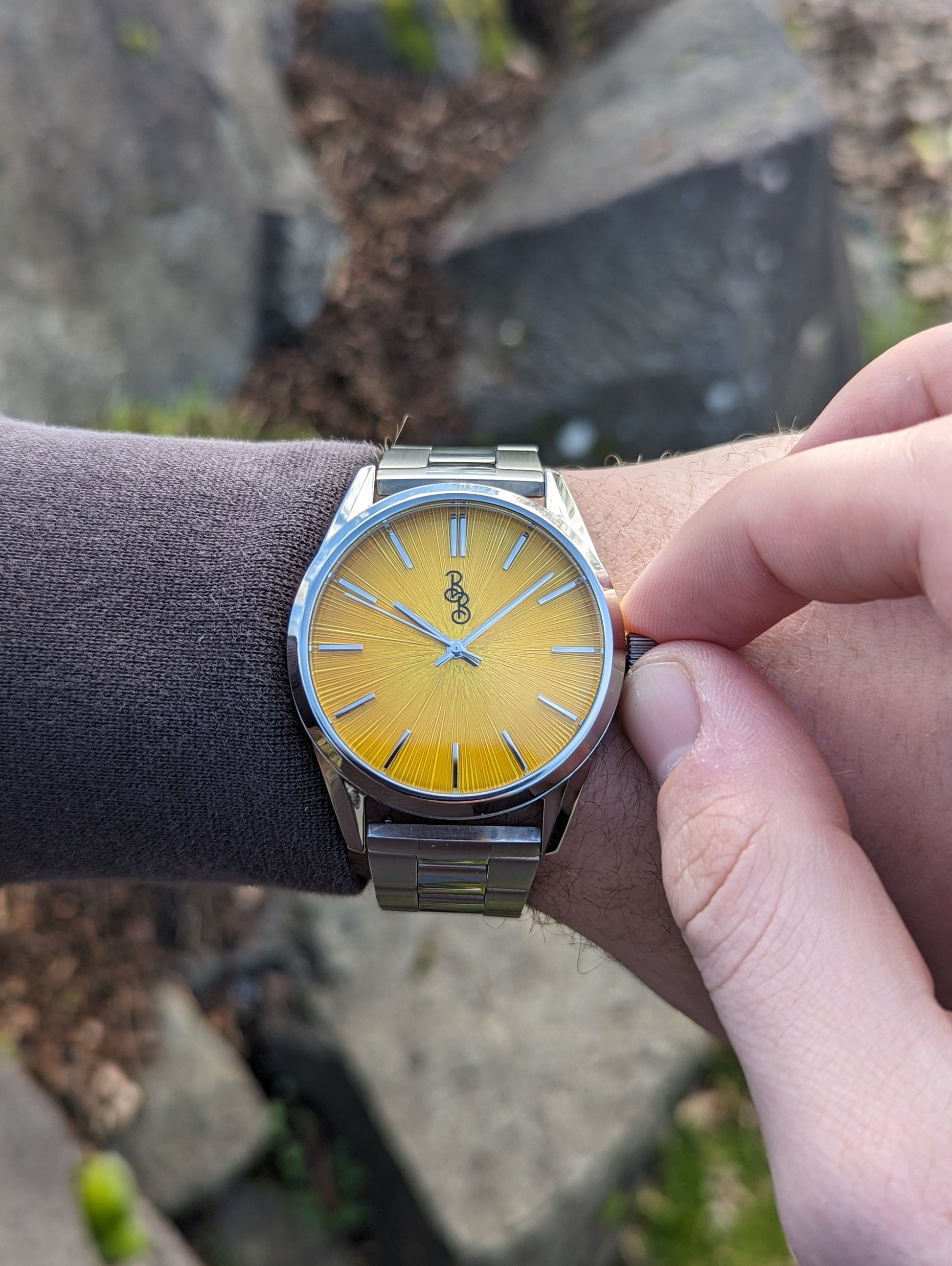 Yellow Sunburst Watch on steel being set, Father's Day gift