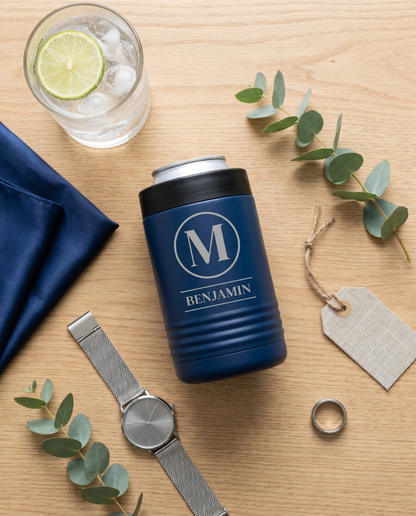 Personalized navy stainless steel insulated can cooler flat lay with gin and tonic and silver watch