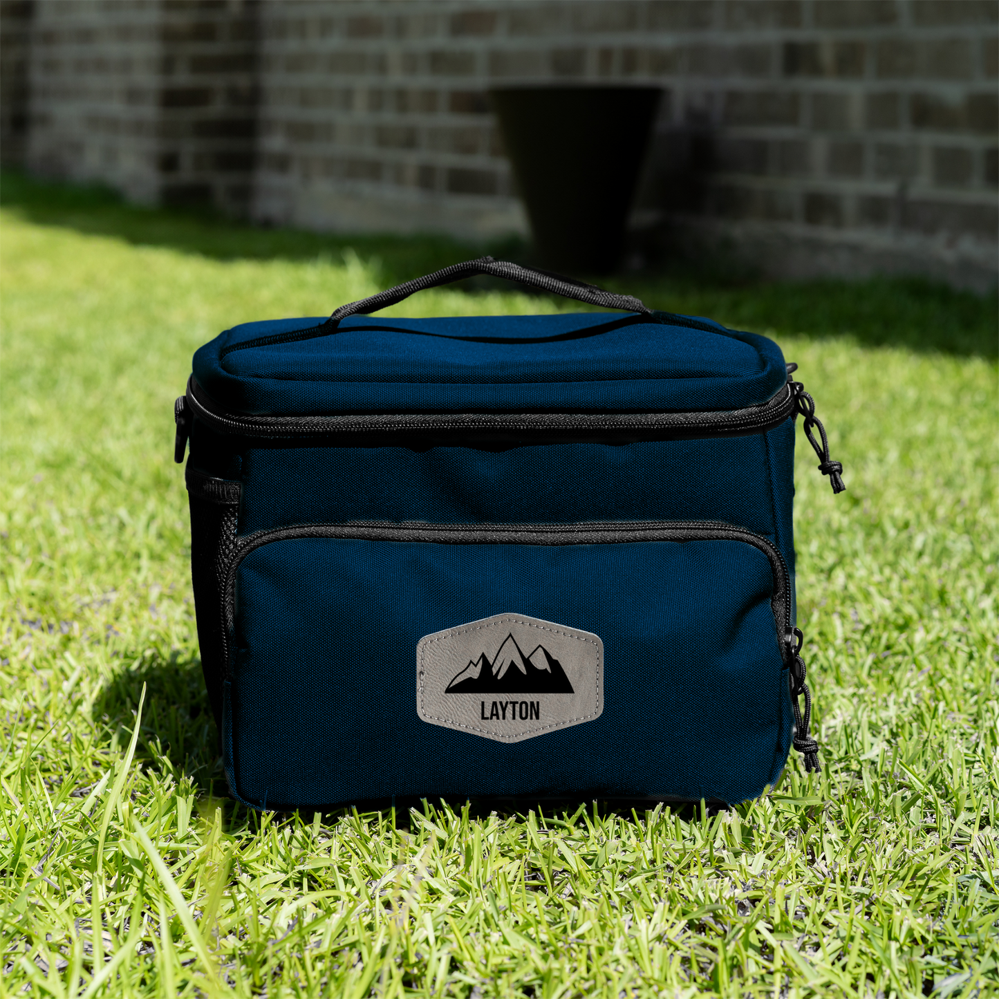 Blue cooler bag with Custom text on grass