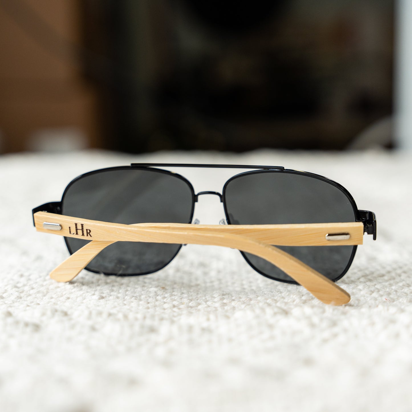 Engraved aviators on model wedding party favor for him