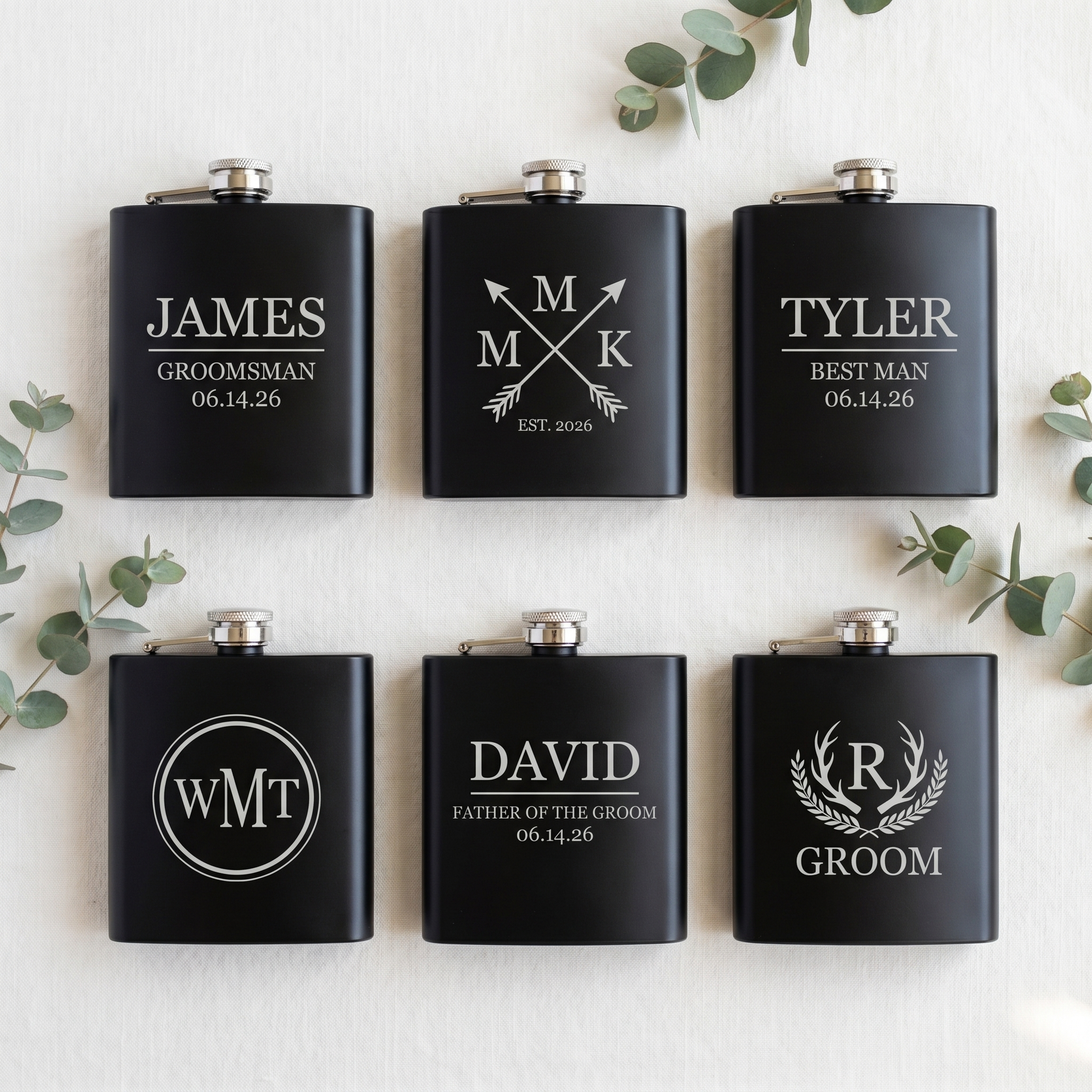 Engraved Black Powder Coated Flask - group lineup of 6 flasks with different engraving designs for the whole wedding party