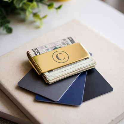 Gold engraved money clip holding cash and cards - personalized gift for him