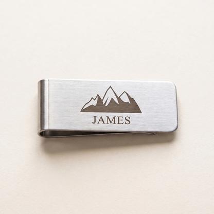 Engraved silver metal money clip with mountain design and the name James - best man gift