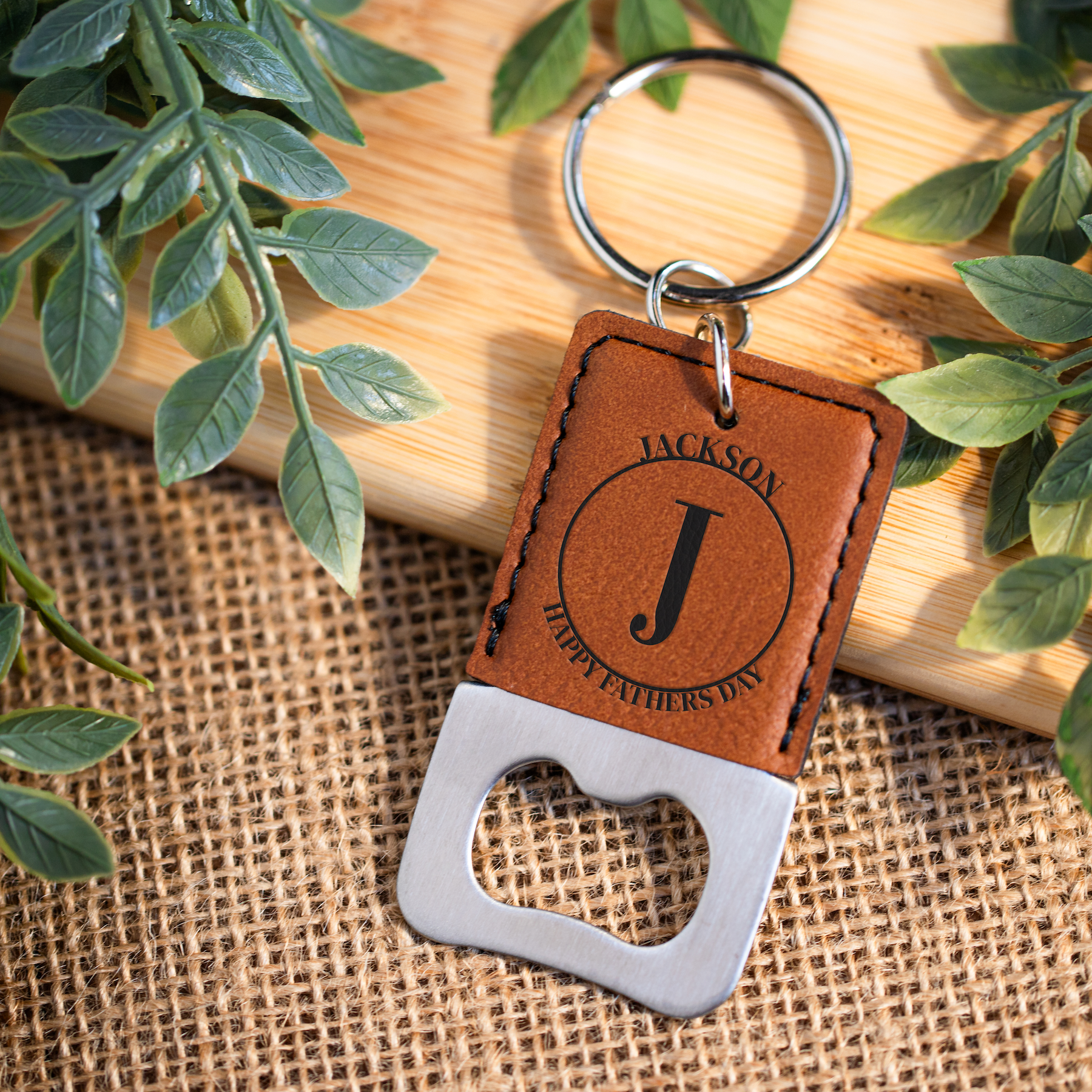 Engraved leather keychain detail - custom bottle opener
