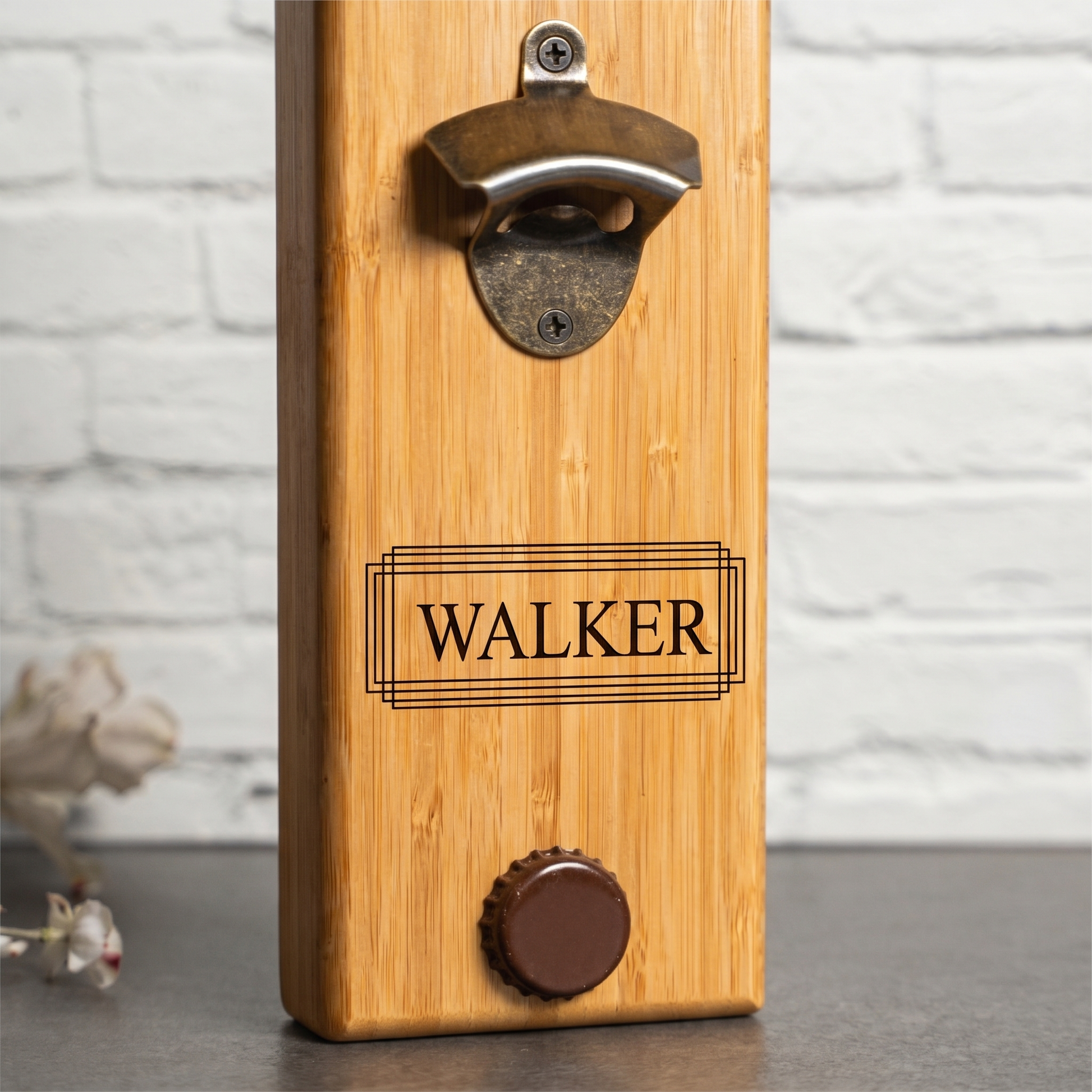 Close-up of Reserve Collection engraved bamboo bottle opener showing the magnetic cap catch