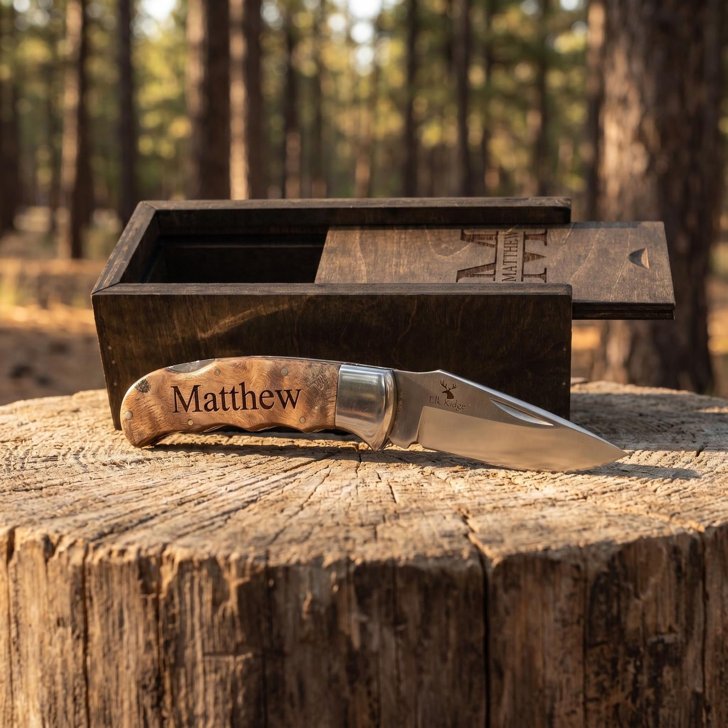 Personalized burl wood handle pocket knife on log slab outdoors with engraved wooden gift box - rustic groomsmen gift