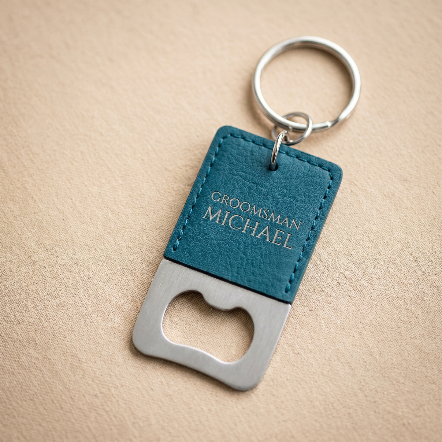Engraved keychain bottle opener in teal vegan leather with GROOMSMAN MICHAEL engraving — Reserve Collection