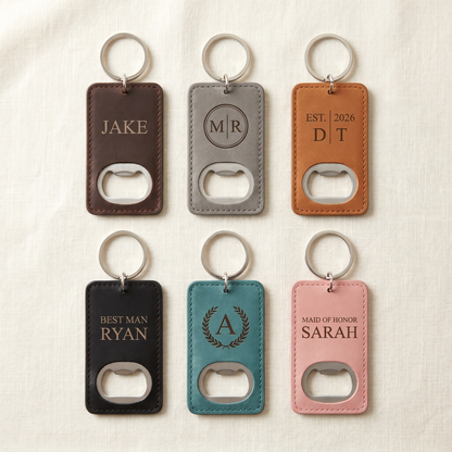 Engraved keychain bottle openers color lineup — all six colors (Dark Brown, Grey, Rawhide, Black, Teal, Pink) with different engraving designs