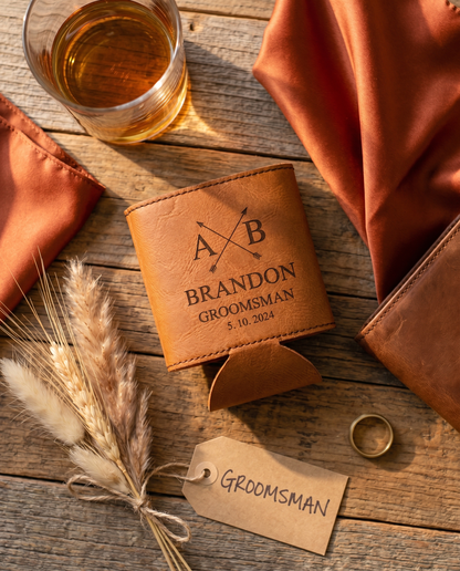 Personalized rawhide tan vegan leather groomsmen can cooler flat lay with rye whiskey and rustic props