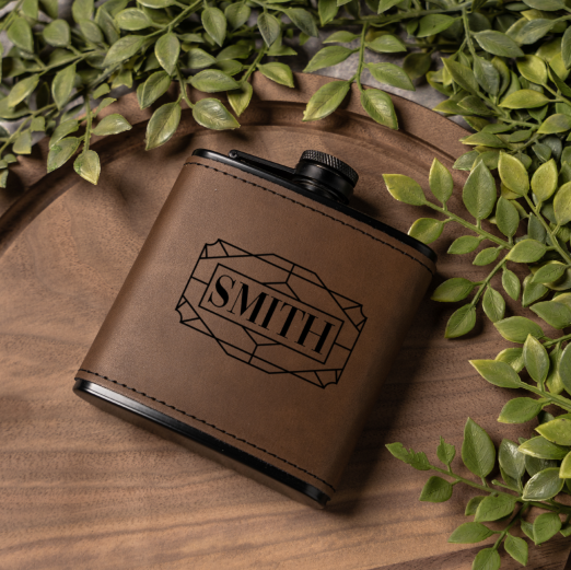 Personalized leather flask close-up showing custom monogram engraving