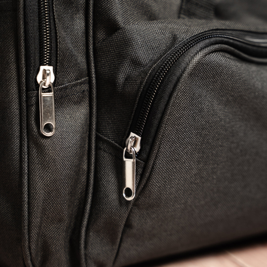 Set of 5 black duffle bags lifestyle - custom duffle bags for men