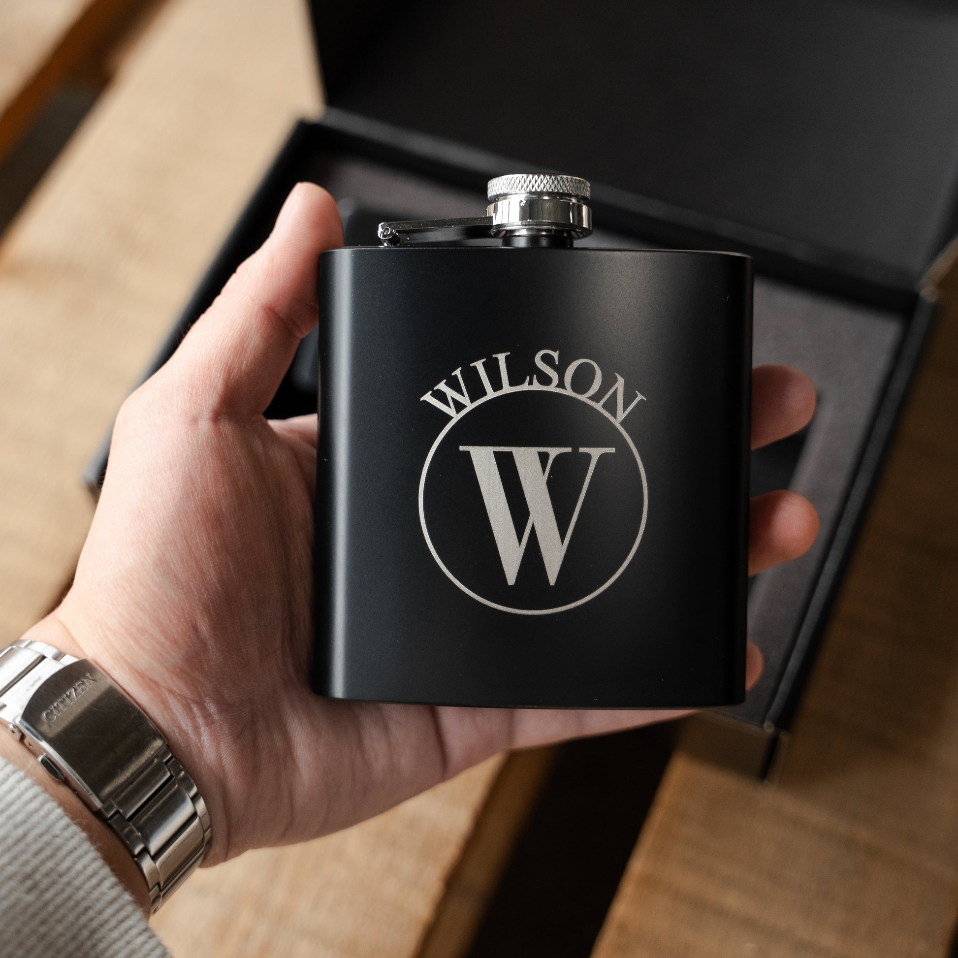 Engraved black lighter close-up - custom groomsmen gift