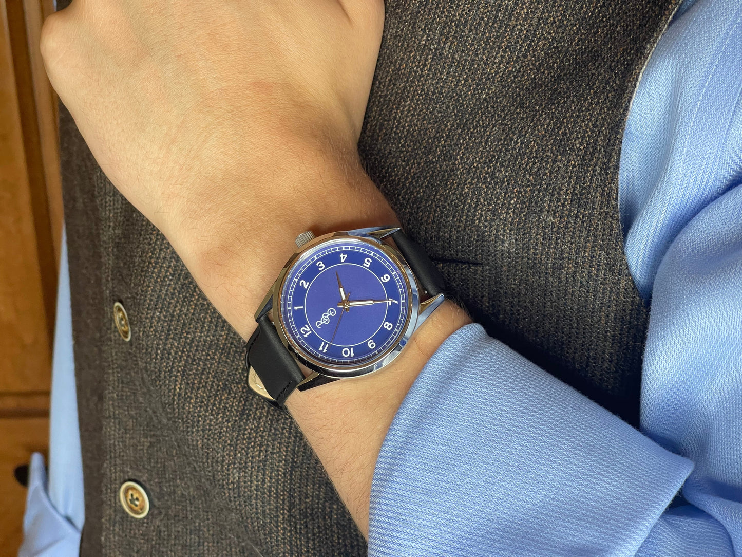 Blue Classic Watch on wrist with cuff, anniversary gift for him